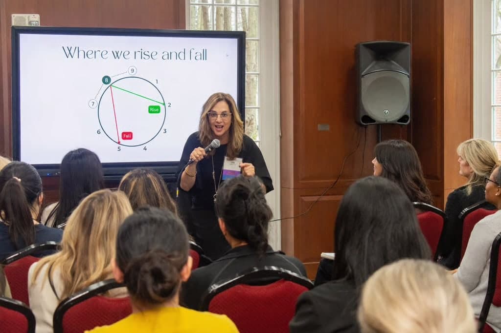 Julie Wright Halbert speaking at the 2025 University of Maryland College Park Women's Development Conference.