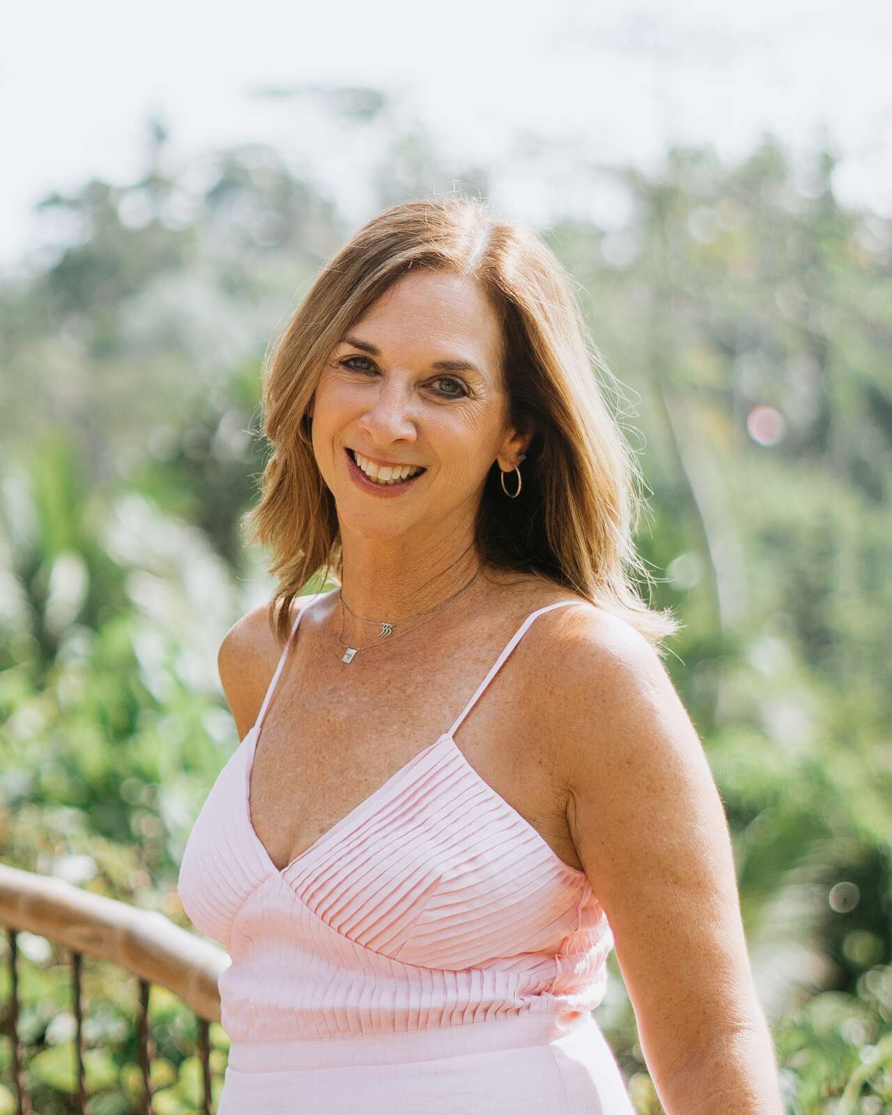 Julie Wright Halbert, smiling to camera
